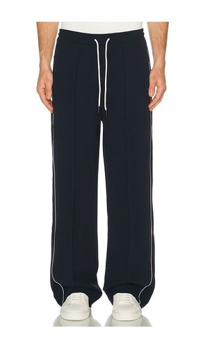 PANTALON FORME JOGGING PIPING en . Taille M. Also en S, XL/1X - KROST - Modalova