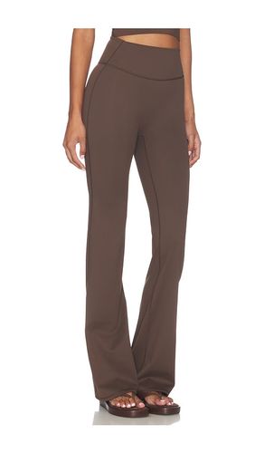 PANTALON SLIM FLARE en . Taille L. Also en M, S, XL, XS - NikeSKIMS - Modalova