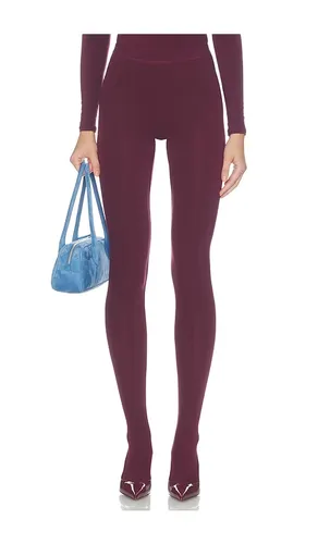 LEGGINGS À BOUT FERMÉ NAKED en . Taille L. Also en M, S, XL, XS - Naked Wardrobe - Modalova
