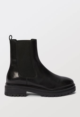 Bottines semelles crantées en cuir - MONOPRIX PREMIUM - Modalova