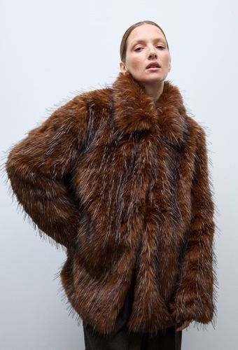 Manteau court en fausse fourrure - MONOPRIX - Modalova