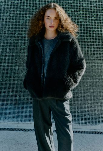 Manteau court en fausse fourrure - MONOPRIX - Modalova