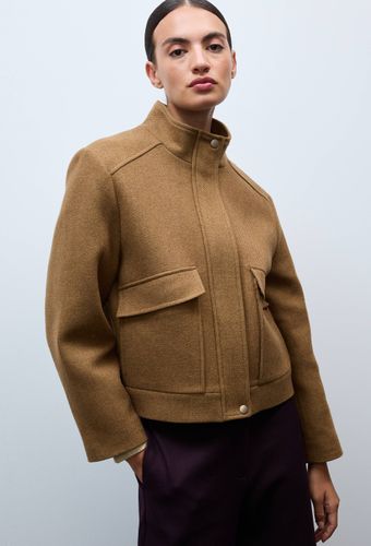 Blouson uni boutonné contenant de la laine - MONOPRIX PREMIUM - Modalova