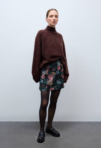 Jupe courte à motifs floraux contenant du coton - MONOPRIX - Modalova