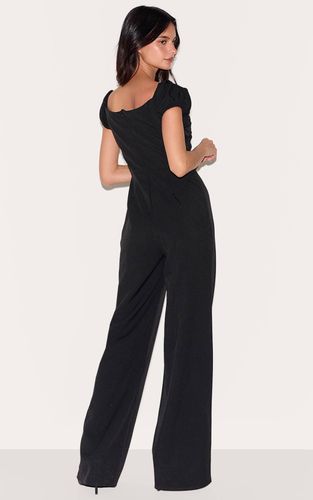 Black Combinaison-pantalon Tissée Décolleté Plongeant Jambe Droite | Taille 34 - PrettyLittleThing - Modalova