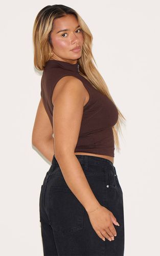 Haut Actif Sculptant Shape À Col Montant Et Fermeture Éclair Devant | Taille 34 - PrettyLittleThing - Modalova