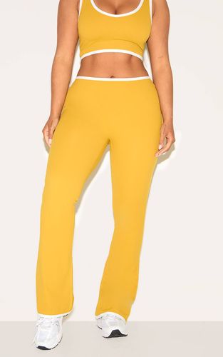 Olive Pantalon Évasé Sculptant Shape Active À Bandes Contrastées | Taille 42 - PrettyLittleThing - Modalova