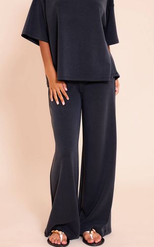 Black Pantalon Large Taille Élastiquée En Modal Petite | Taille 32 - PrettyLittleThing - Modalova