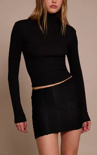 Black Mini-jupe En Jersey Texturé | Taille 42 - PrettyLittleThing - Modalova