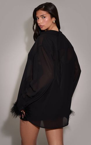 Black Chemise Oversize Transparente À Manchettes En Plumes | Taille 42 - PrettyLittleThing - Modalova