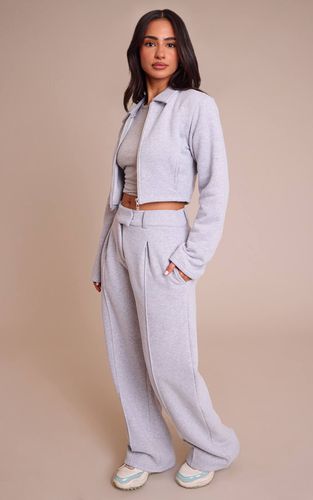Grey Marl Jogging Petite Taille À Jambes Larges Avec Détails De Coutures Ajustées | Taille Medium - PrettyLittleThing - Modalova