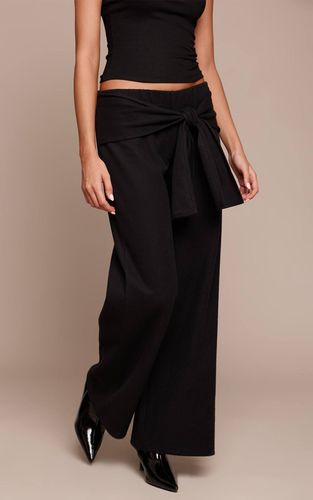 Black Pantalon Large Côtelé Épais Avec Détail De Taille Nouée | Taille 32 - PrettyLittleThing - Modalova