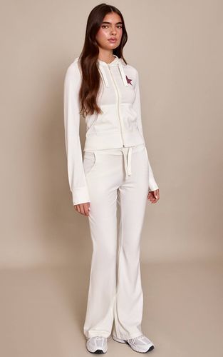 Cream Pantalon Évasé Ajusté À Imprimé Étoiles | Taille XS - PrettyLittleThing - Modalova
