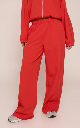 Red Jogging Interlock À Jambes Larges Avec Passepoil Contrasté | Taille Small - PrettyLittleThing - Modalova