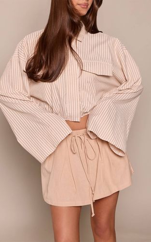 Sand Mini-jupe En Mélange Coton Lin Avec Détail Panneau Noué | Taille 42 - PrettyLittleThing - Modalova