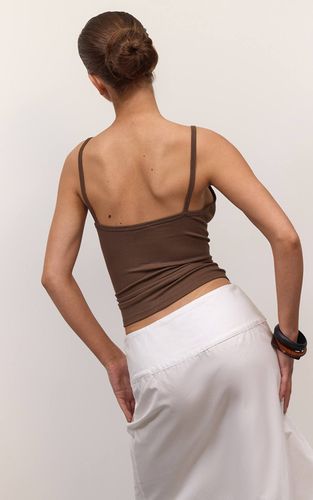 Débardeur Côtelé Doux À Bretelles Et Col En V | Taille 42 - PrettyLittleThing - Modalova