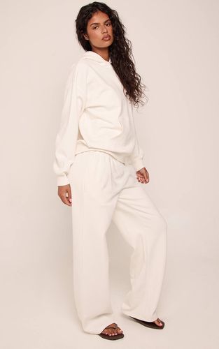 Cream Pantalon De Jogging Large En Jersey Interlock | Taille XS - PrettyLittleThing - Modalova