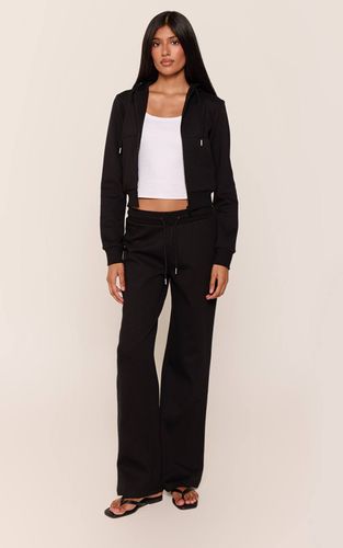 Black Jogging Ajusté Taille Basse À Imprimé Santé | Taille XS - PrettyLittleThing - Modalova
