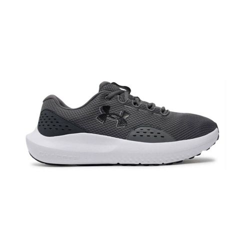 Baskets basses Charged Surge 4 - Under Armour - Modalova