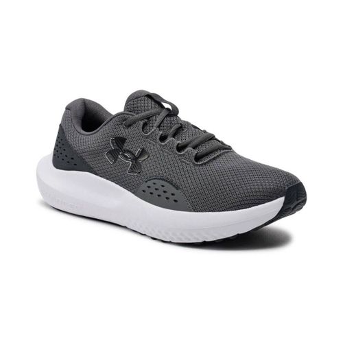 Baskets basses Charged Surge 4 - Under Armour - Modalova