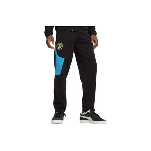 Jogging Puma Homme MANCHESTER WOVEN - Puma - Modalova