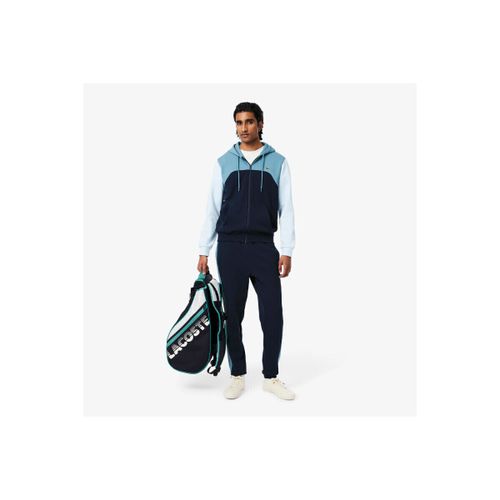 Pantalon PANTALON DE SURVÊTEMENT FUSELÉ COLOR-BLOCK BLEU - Lacoste - Modalova