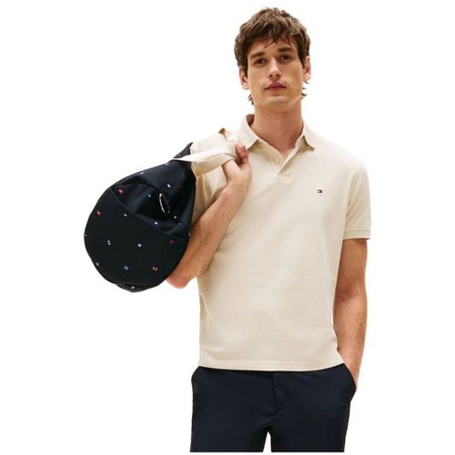 T-shirt MW0MW17770 RBT REG POLO-ACG NEWSPRINT - Tommy Hilfiger - Modalova