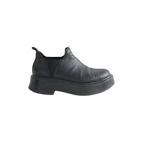 Bottines Mocassins Robin en cuir noirs - The Row - Modalova
