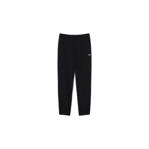 Jogging Pantalon de survêtement Sport déperlant noir - Lacoste - Modalova