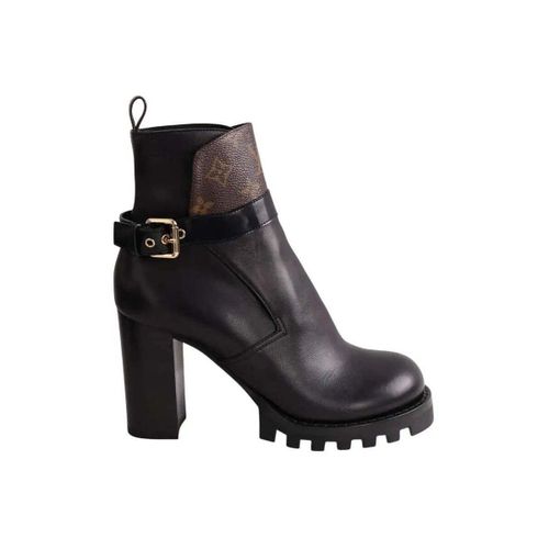 Bottines Boots à boucles noires - Louis Vuitton - Modalova