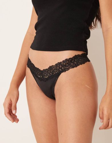 Attraction - String avec dÃ©tails en dentelle - Noir Noir M female - Calvin Klein - Modalova