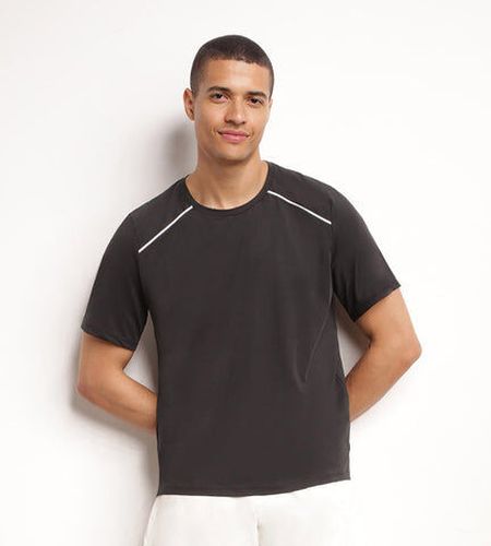T-shirt de sport en matière aérée Noir Move Noir S - Dim - Modalova
