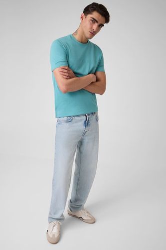 T-Shirt Petit Logo - Guess - Modalova