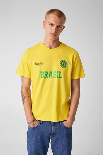 T-Shirt Nation - Guess Jeans - Modalova