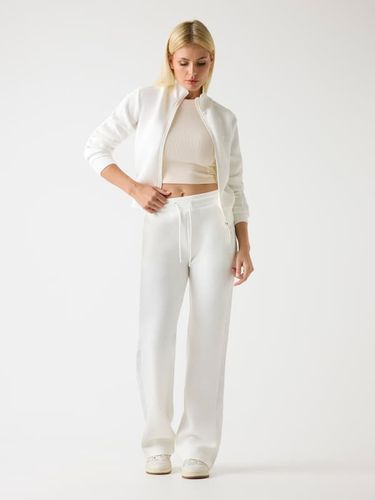 Pantalon Néoprène Logo Sur Le Côté - Guess - Modalova