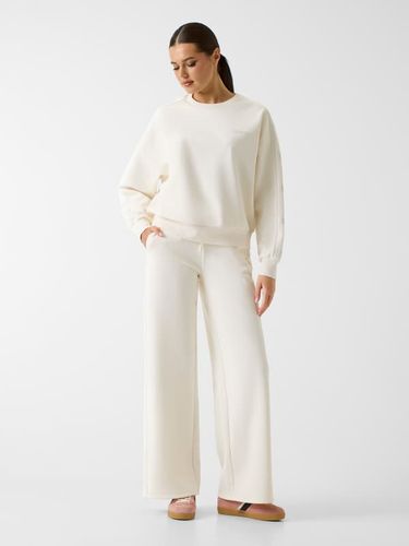 Pantalon Large À Logo - Guess - Modalova