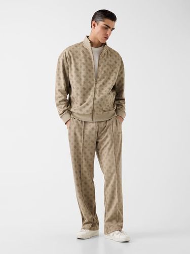 Pantalons De Survêtement Avec Logo Partout - Guess - Modalova