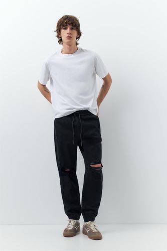 Pantalon Jogger En Jean Déchiré - Pull&Bear - Modalova