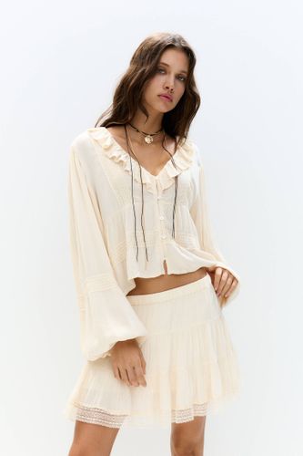 Minijupe À Volants Et Bas En Dentelle - Pull&Bear - Modalova