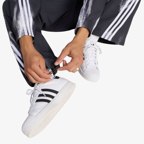 Pantalon de survêtement adidas Adilenium 6 Trackpant M - adidas Originals - Modalova