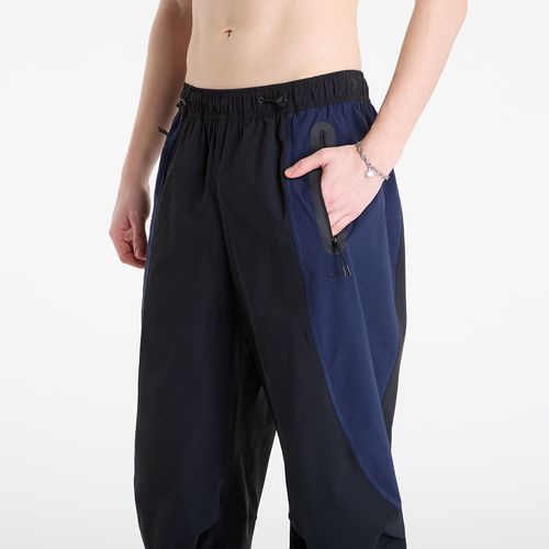 Pantalons Tech Men's Dri-FIT Woven Color-Block Pants / / M - Nike - Modalova