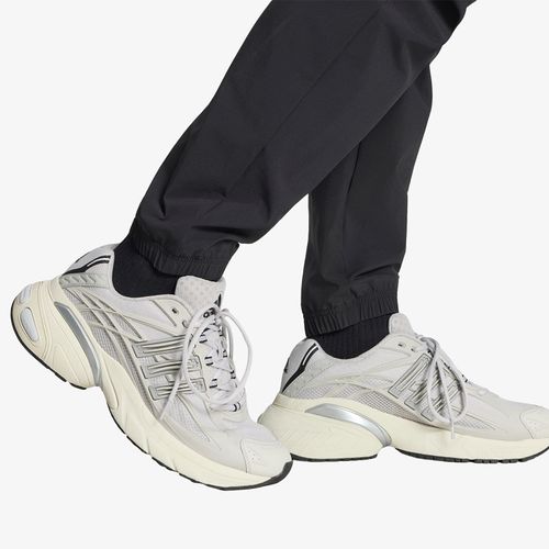 Pantalons adidas Tech Trefoil Essentials Track Pant XL - adidas Originals - Modalova