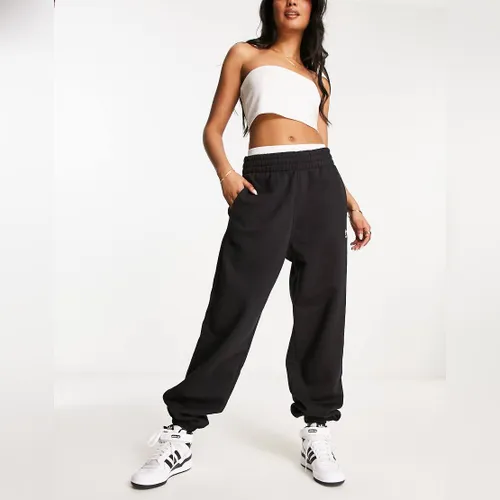 Jogging adidas resserré en bas hotsell